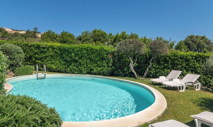 Punta Sardegna Villa | Villa 'Viola Con Piscina E Giardino' with Sea View, Private Pool and Wi-Fi