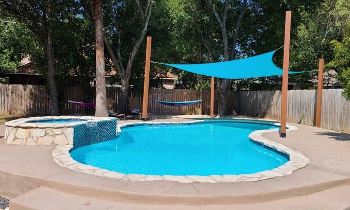 Saxony House | VRBO HOME AWAY Paradise Getaway House- With Pool and Hot Tub!