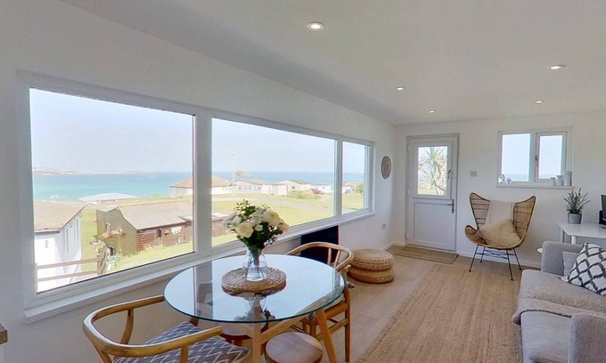 Hayle Ski Chalet | Vu an Tecca enjoys spectacular sea views and is newly refurbished.