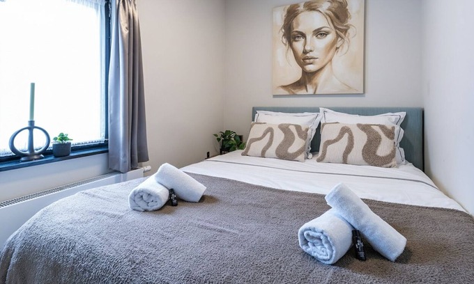 Centrum Apartment | Wake up in the heart of Tilburg in a cozy hotel bed that blends past charm with modern comfort