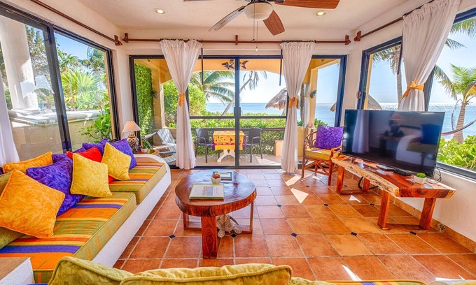 Akumal Condo | Walk onto the white sandy beach of Half Moon Bay from your patio door!