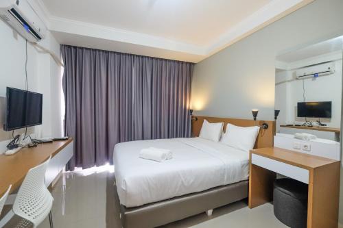 East Jakarta Apartment | Warm and Relax Studio at Signature Park Grande Apartment By Travelio