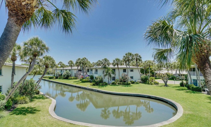 Whitney Beach Condo | Watch Manatees outside your Window only Steps to the Beach and Pool.