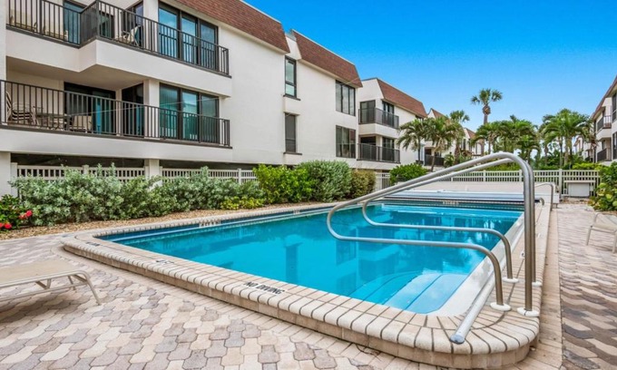Holmes Beach House | Water's Edge 205 by AMI Locals