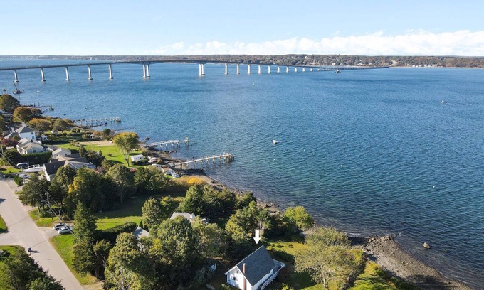 Jamestown Shores House | Waterfront A-frame Chalet with shore beach overlooking Narragansett Bay