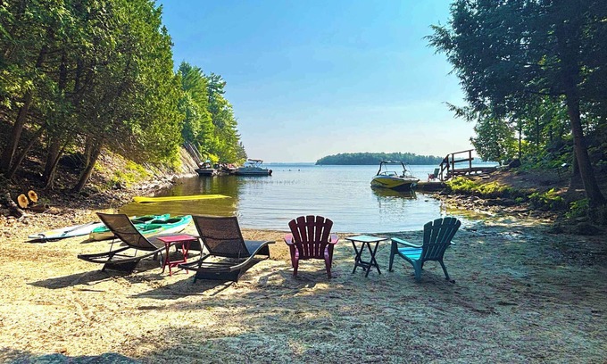Tay Valley House | Waterfront dream cottage with hot tub, pool table, and fire pit