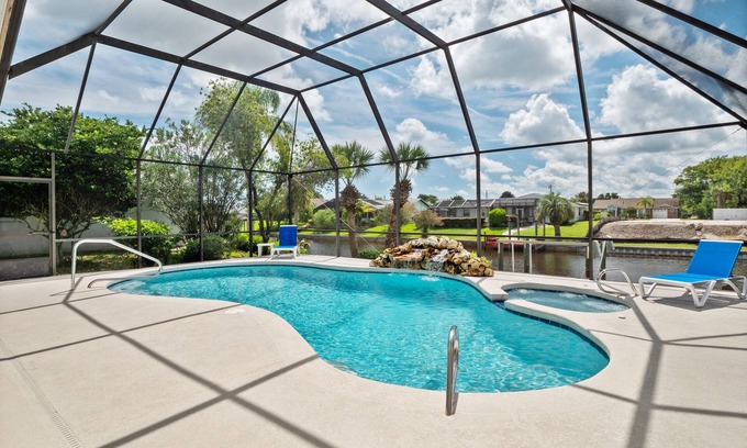Palm Harbor House | Waterfront Home with Pool, Hot Tub, Dock, Game Room & 10 minutes to the Beach