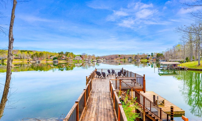 Moneta Cottage | Waterfront lake-view home with dock, fireplace, pool table, kayaks, & firepit