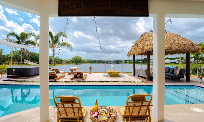 Florida North Atlantic Coast Villa | Waterfront w/ Beach, Htd Pool Cinema Gameroom Tiki