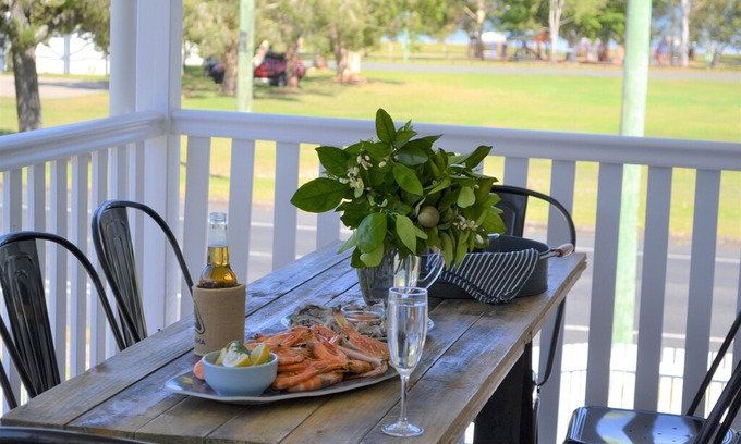 Tin Can Bay House | Watoomba House Seaviews overlooking park, sleeps 8, air con, room for your boat