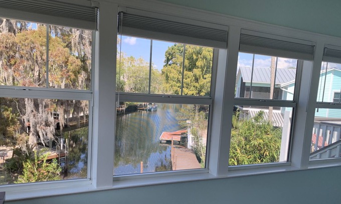 Weeki Wachee Gardens House | Weeki Wachee Kayak deck home on a quiet canal with a dock