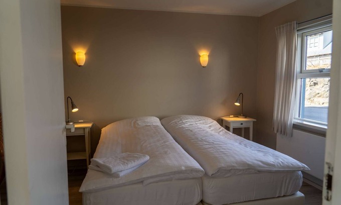 Hafnarfjordur Apartment | Welcome to our inviting lower floor apartment nestled in the heart of Hafnarfjörður.