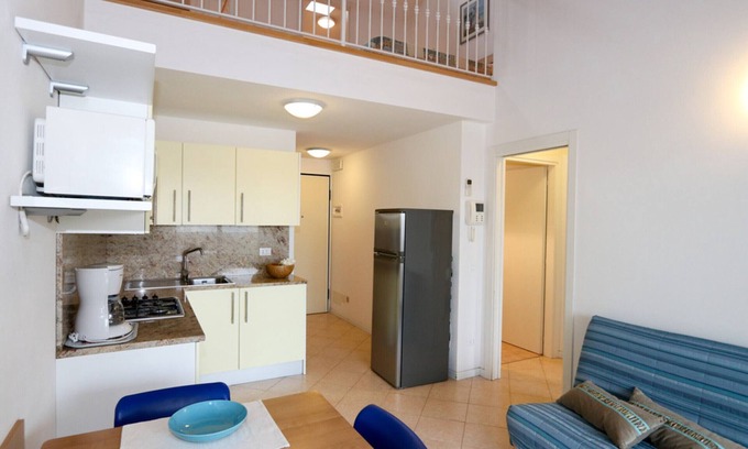 Bibione Apartment | Welcoming flat with mezzanine close to the beach