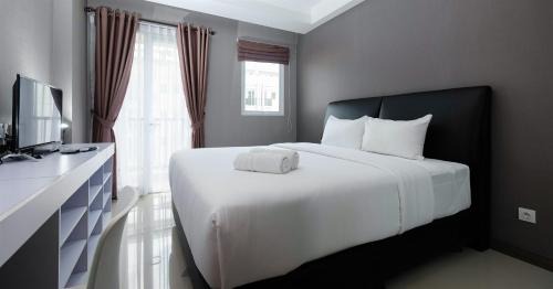 East Jakarta Apartment | Well Designed Studio Apartment Signature Park Grande By Travelio