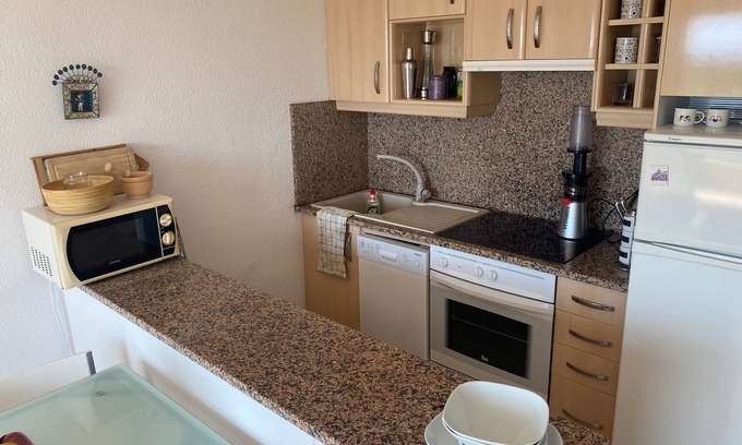 Empuriabrava Apartment | Well-equipped apt, in the center of town, near beach and shops, overlooking natural park and sea.