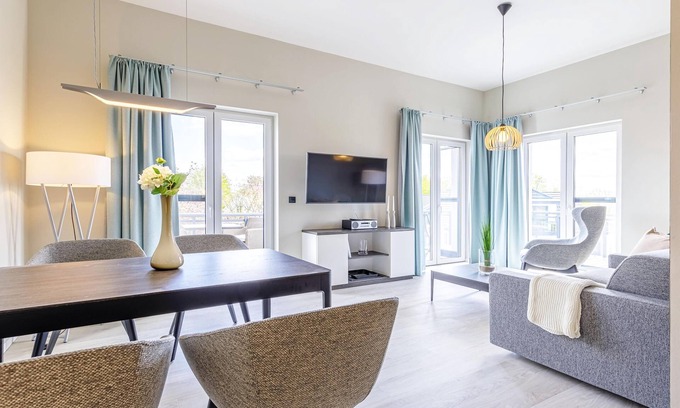 Ostseebad Wustrow Apartment | Wellness vacation with large south-east balcony and view of the Saaler Bodden