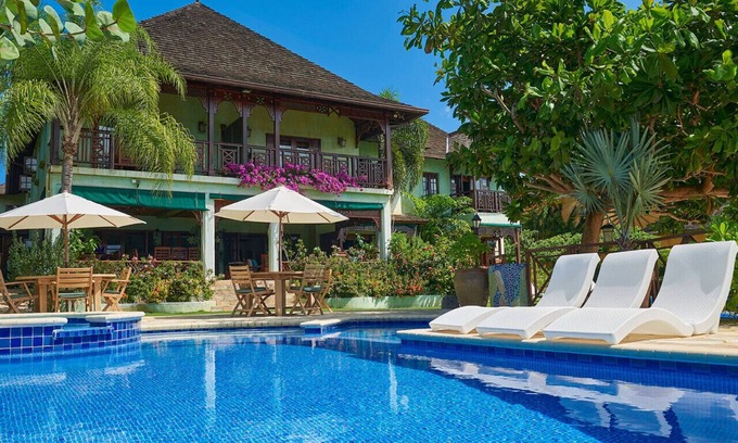 Discovery Bay Villa | Whispering Waters Villa- Exclusive Beachfront Retreat. Pool, & Spacious Terraces