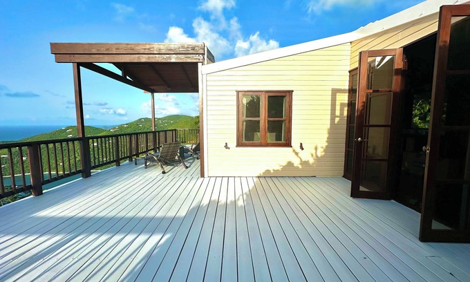 Brewers Bay Cottage | Whole Bayview Cottage with large deck and sea view, mid-way to beaches and town.