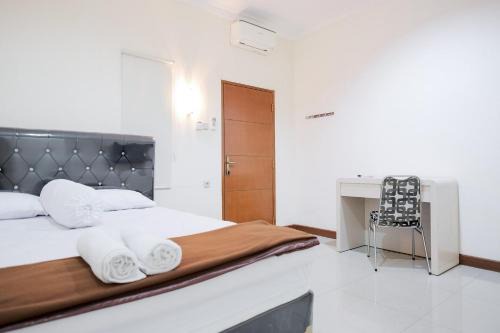 Jakarta Hotel | wisma delapan Mitra RedDoorz
