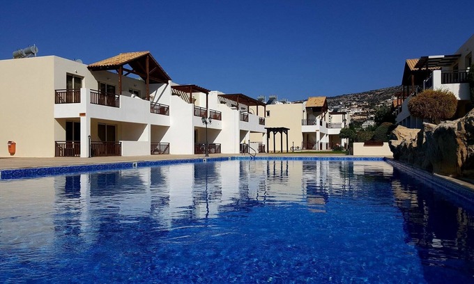 Peyia Town Apartment | Wonderful 2 bedroom ground level poolside apartment, 3 pools, FREE WIFI