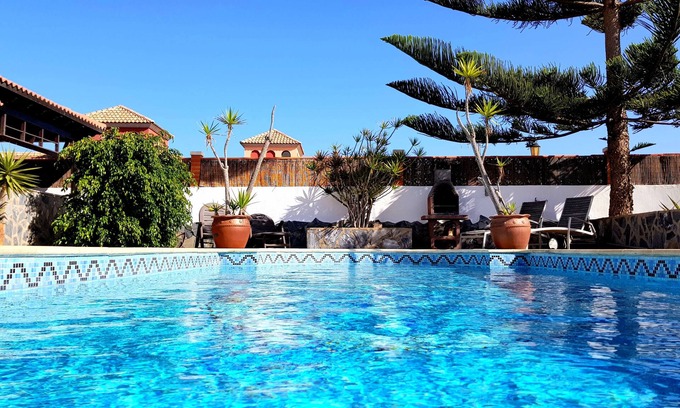 Corralejo Villa | Wonderful villa with a large private heated pool and stunning views to the dunes