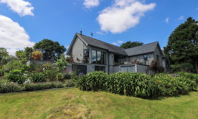 Helford House | WOOD MEADOW, pet friendly, with open fire in Helford