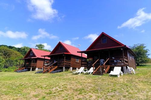 Miedzyzdroje House | Wooden House in Lubin by Lake Wicko