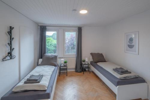 Oberndorf am Neckar Apartment | WORK&SLEEP - moderne Apartments mit Einzelbetten, TV, WLAN, Bettwäsche und Handtücher
