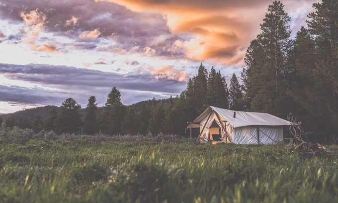 Island Park RV Rental | Yellowstone canvas tent w/ king bed & sleeper sofa