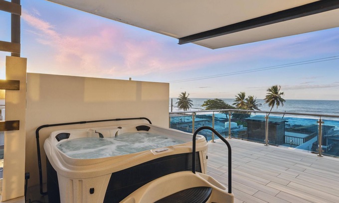 Arecibo Pueblo House | Zaturn Beach House – Oceanfront villa w/rooftop terrace & jacuzzi
