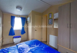 6 berth caravan to hire at St Osyth Beach Holiday Park in Essex ref 28015D