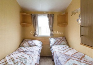 6 berth caravan to hire at St Osyth Beach Holiday Park in Essex ref 28015D