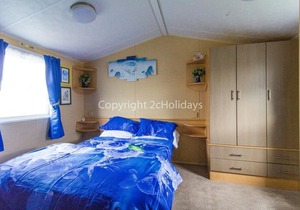 6 berth caravan to hire at St Osyth Beach Holiday Park in Essex ref 28015D