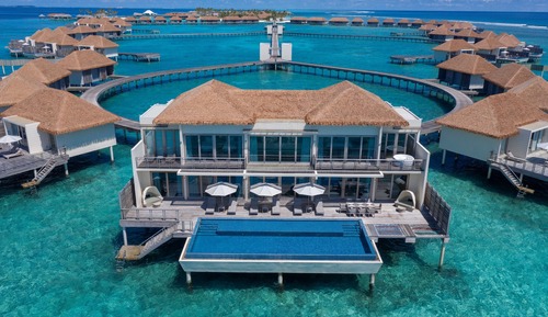 Presidential three bedroom over water pool villa with free access to VIP seaplane lounge on arrival
