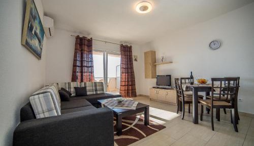 One-Bedroom Apartment with Balcony and Sea View
