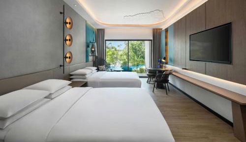 "Poolside Deluxe Twin, Guest room, 2 Double, Balcony, Terrace with Free Scheduled Shuttle to Hotel’s Beach Facility  "