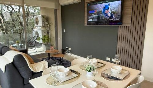 One-Bedroom Apartment with Balcony and City View