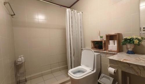 Queen Room with Shared Bathroom