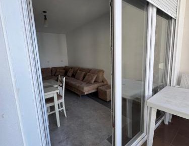 One-Bedroom Apartment with Balcony and Sea View