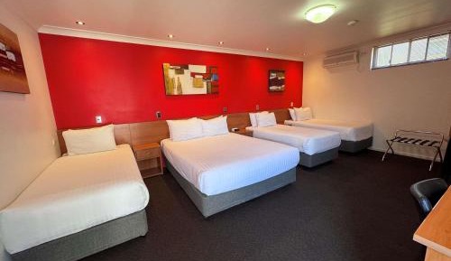Family Room with a Queen Bed and Two Single Beds