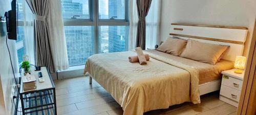 One-Bedroom Apartment with Balcony and City View