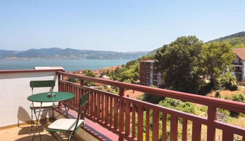 Two-Bedroom Apartment with Balcony and Terrace