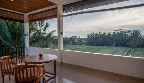 Deluxe Room with Balcony and Rice Field View