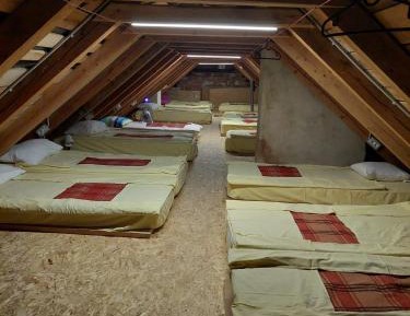 Single Bed in Dormitory Room