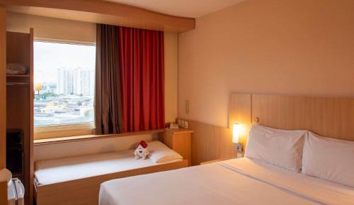 Standard Room with One Double and One Child Bed