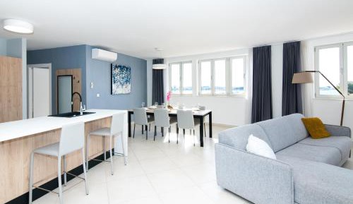 Three-Bedroom Apartment with Sea View