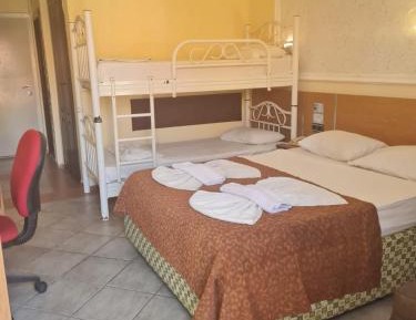 Economy Quadruple Room with Shared Bathroom