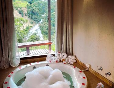 Chalet with Spa Bath and Waterfall View