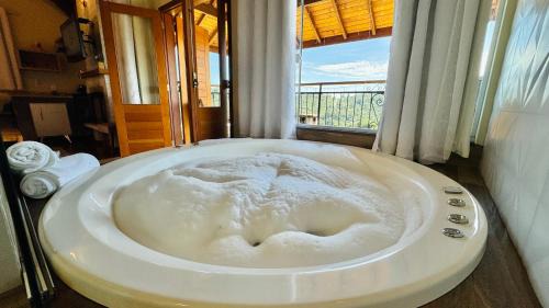 Master Suite with Spa Bath and Balcony