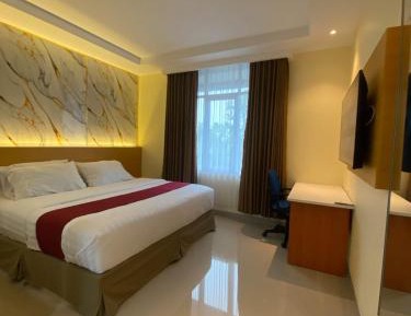 Deluxe Room (2 Adults + 1 Child)